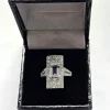 Bague en or blanc 18 carats avec aigue-marine et diamants
