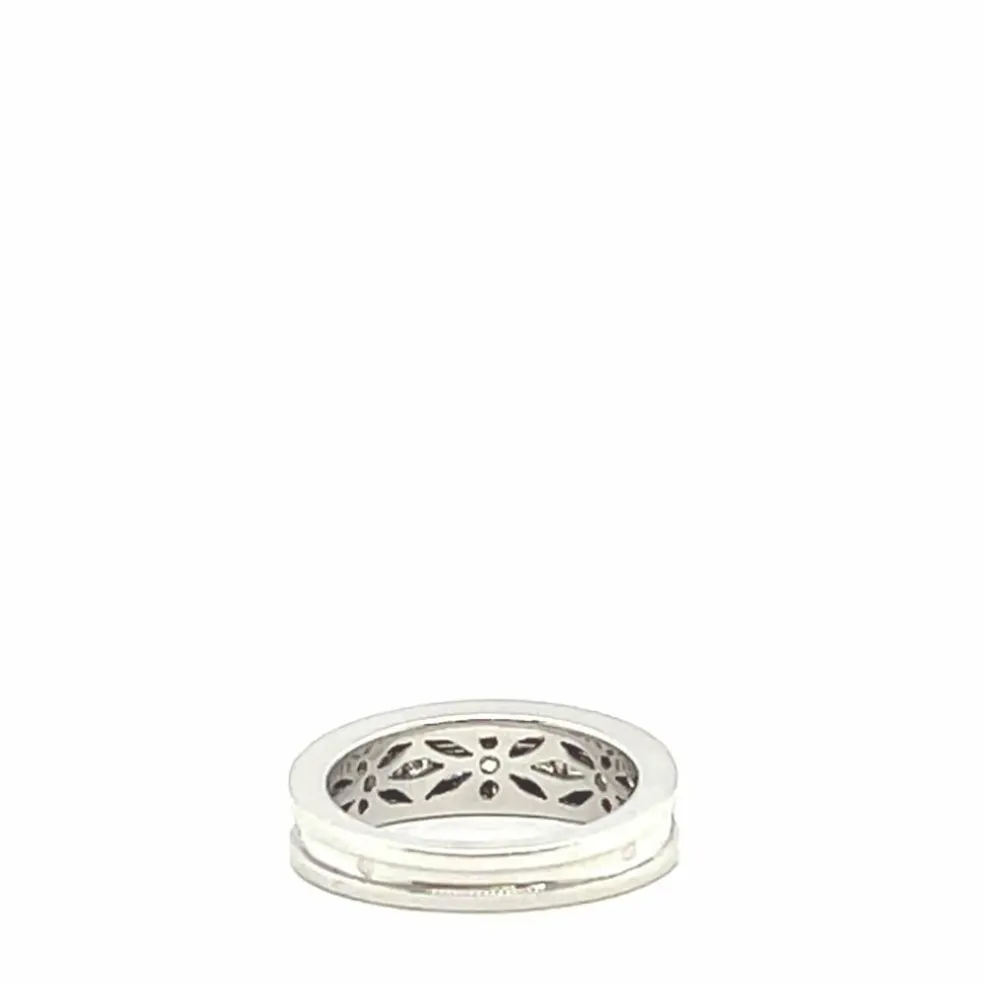 Bague en or blanc 18 carats sertie de diamants taille princesse et brillant