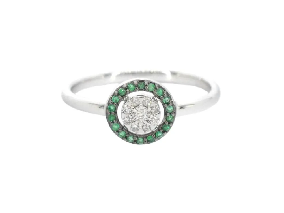 Bague en or blanc avec diamants et émeraude