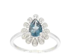 Bague en or blanc avec diamants et topaze
