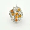 Bague en or blanc avec diamants jaunes et blancs
