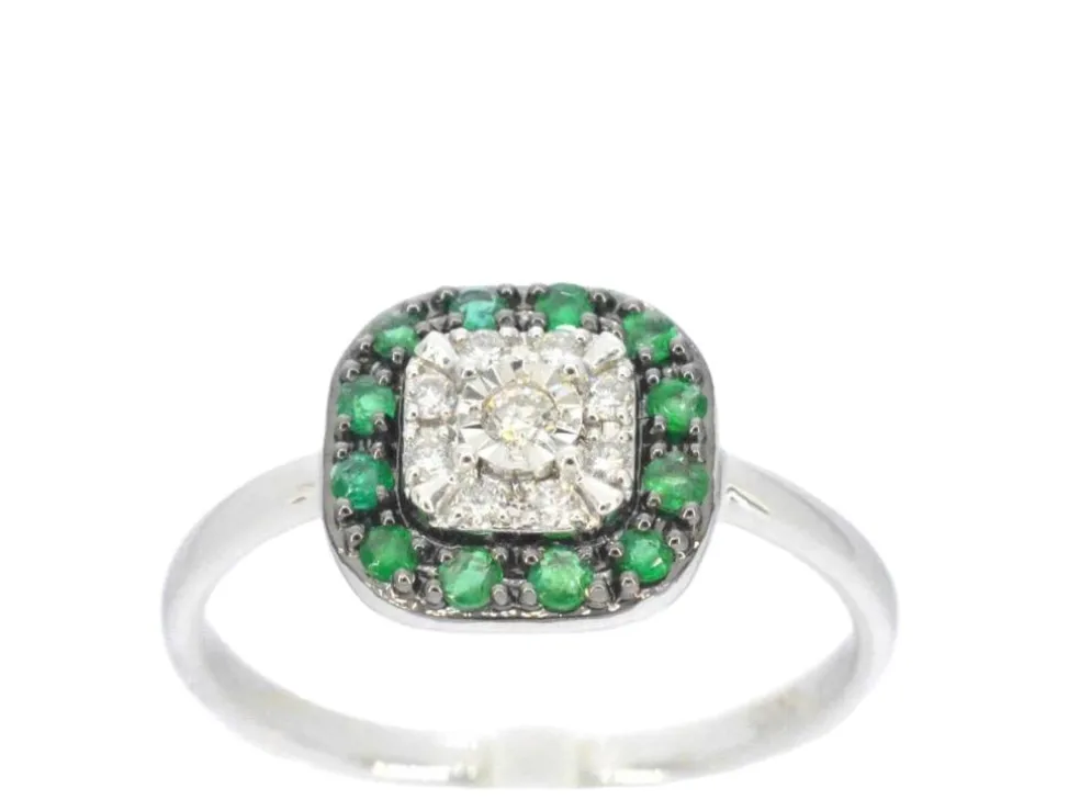 Bague en or blanc avec diamants et émeraude