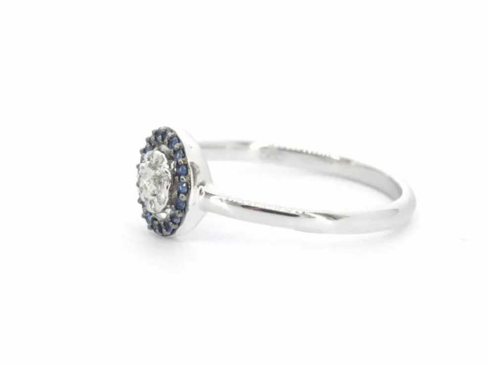 Bague en or blanc avec diamants et saphirs