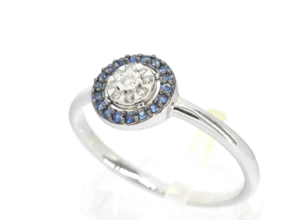 Bague en or blanc avec diamants et saphirs