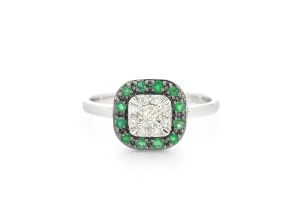 Bague en or blanc avec diamants et émeraude