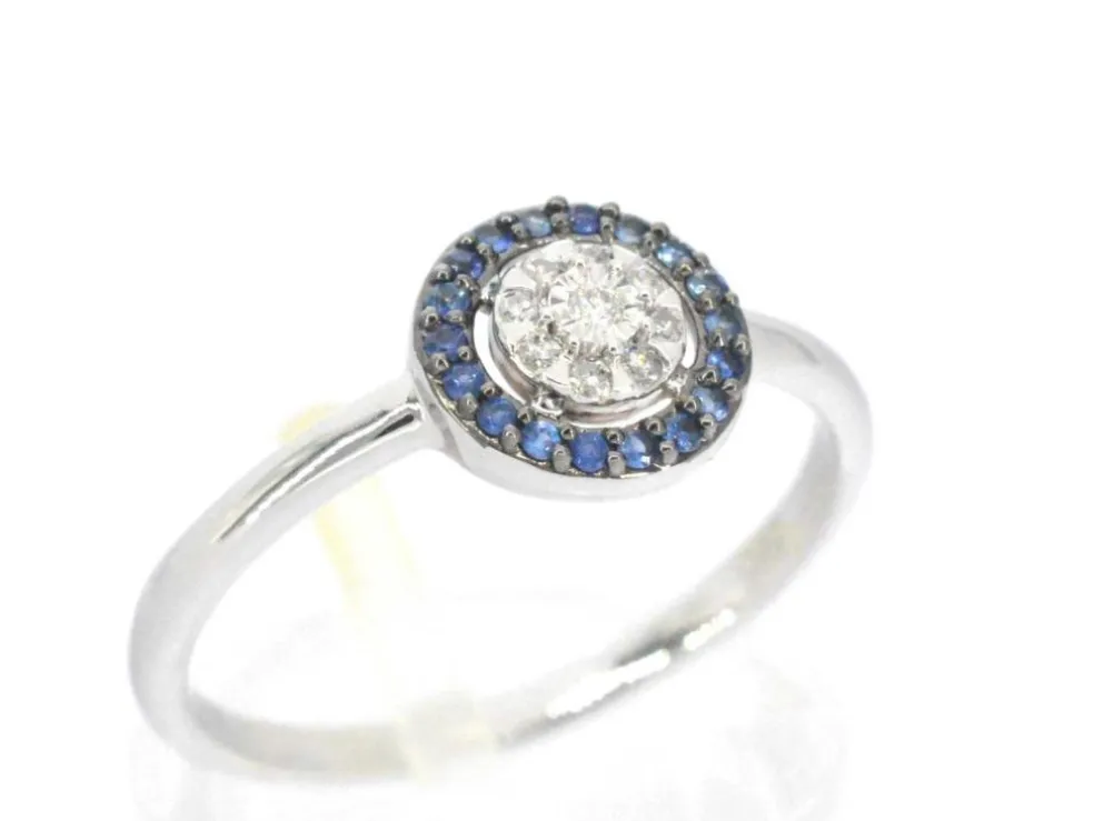 Bague en or blanc avec diamants et saphirs