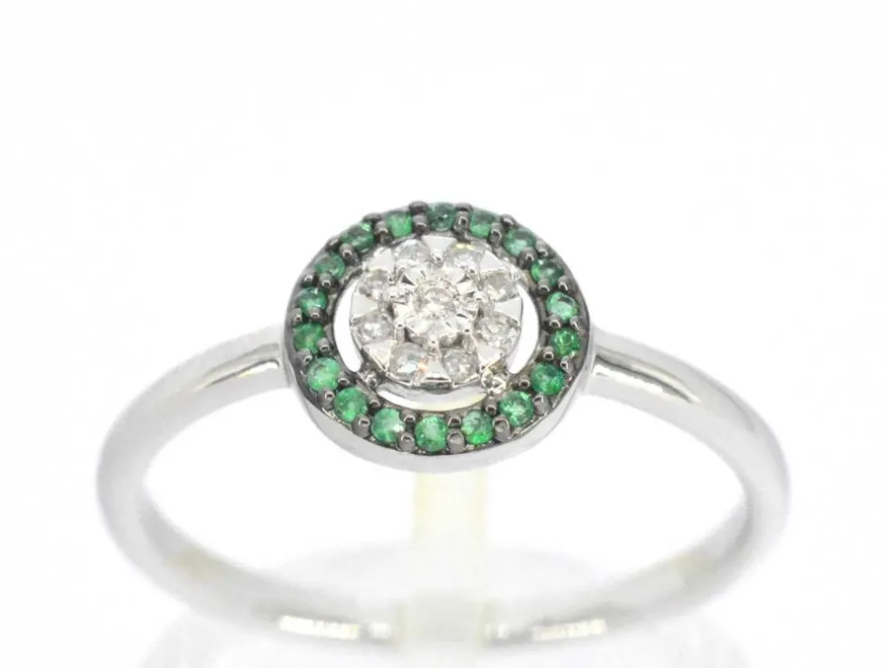 Bague en or blanc avec diamants et émeraude