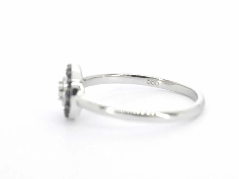 Bague en or blanc avec diamants et saphirs