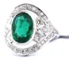Bague en or blanc avec émeraude et diamants
