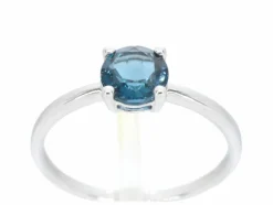 Bague en or blanc avec topaze