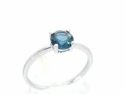 Bague en or blanc avec topaze