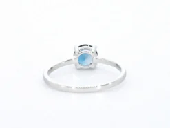 Bague en or blanc avec topaze