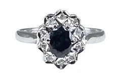 Bague en or blanc saphir et 10 diamants