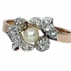 Bague en or, diamants et perle