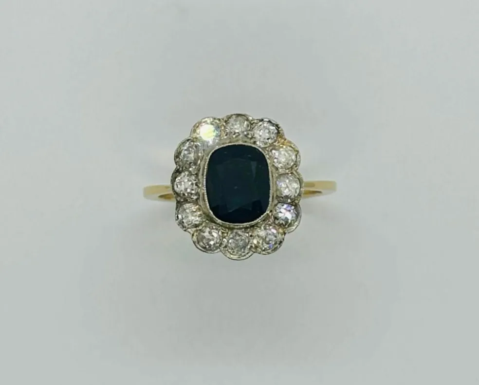 bague en or et platine avec diamants et saphir