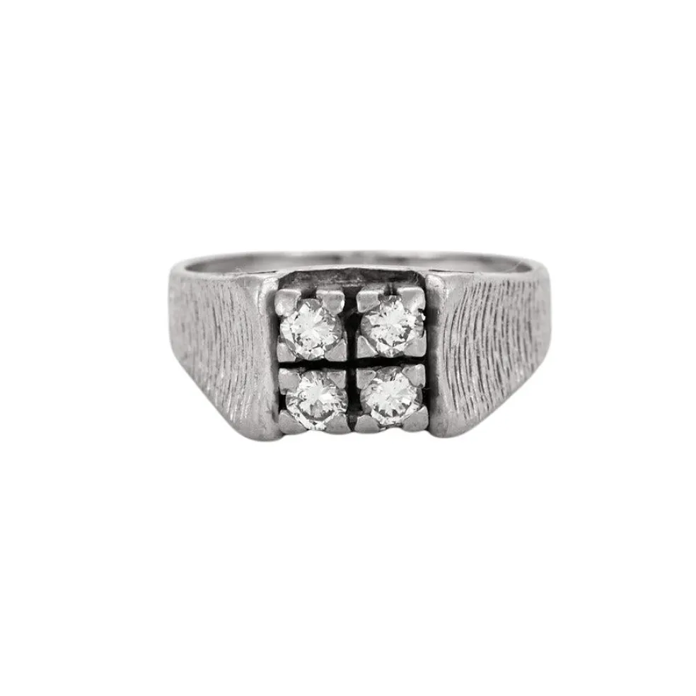 Bague en or gris et diamants