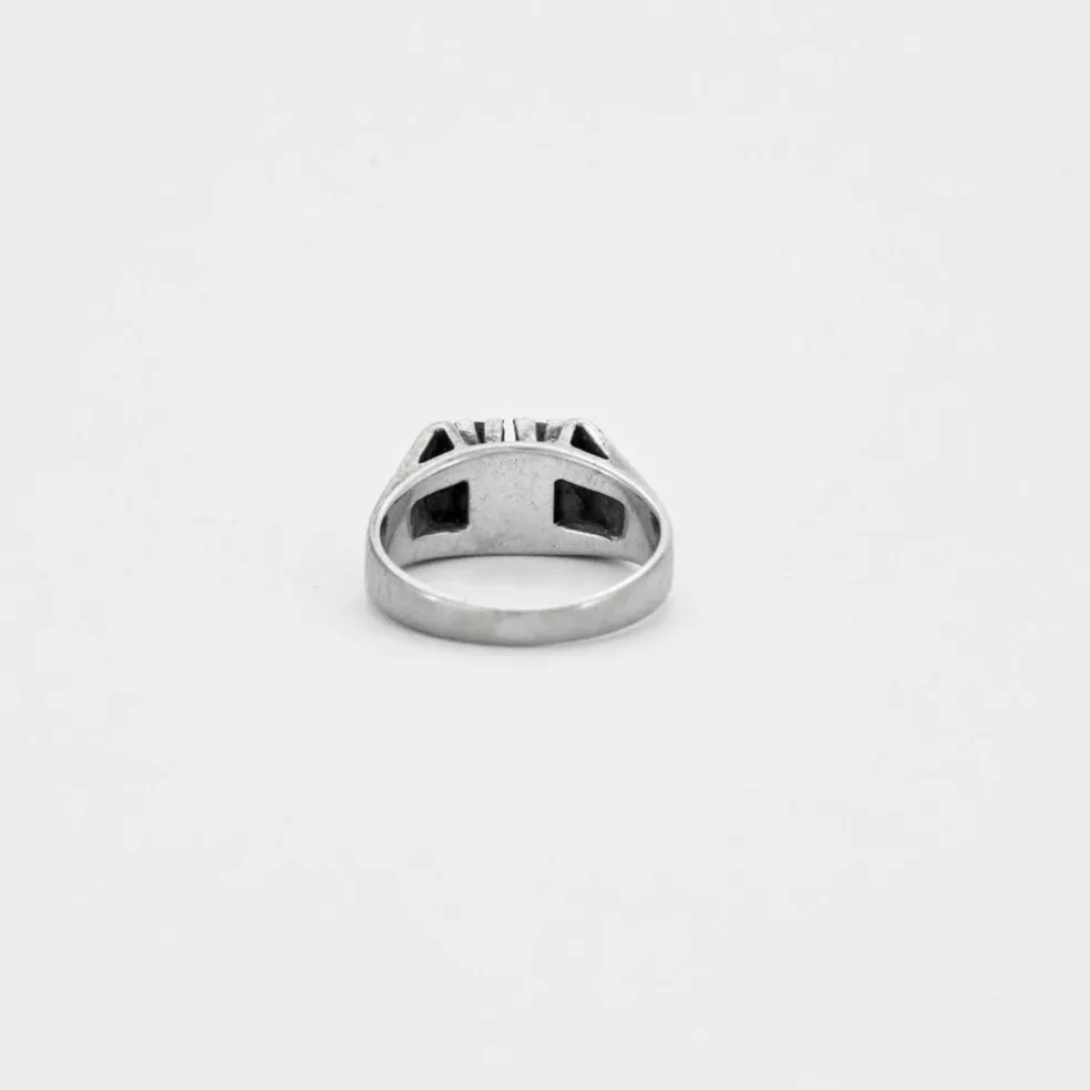 Bague en or gris et diamants