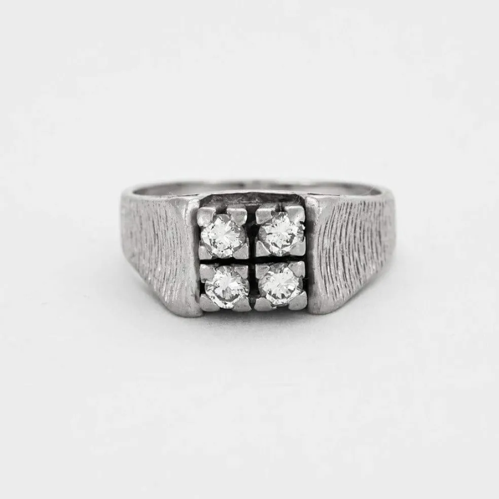 Bague en or gris et diamants