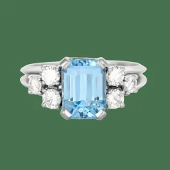 Bague en or gris et pierre bleue