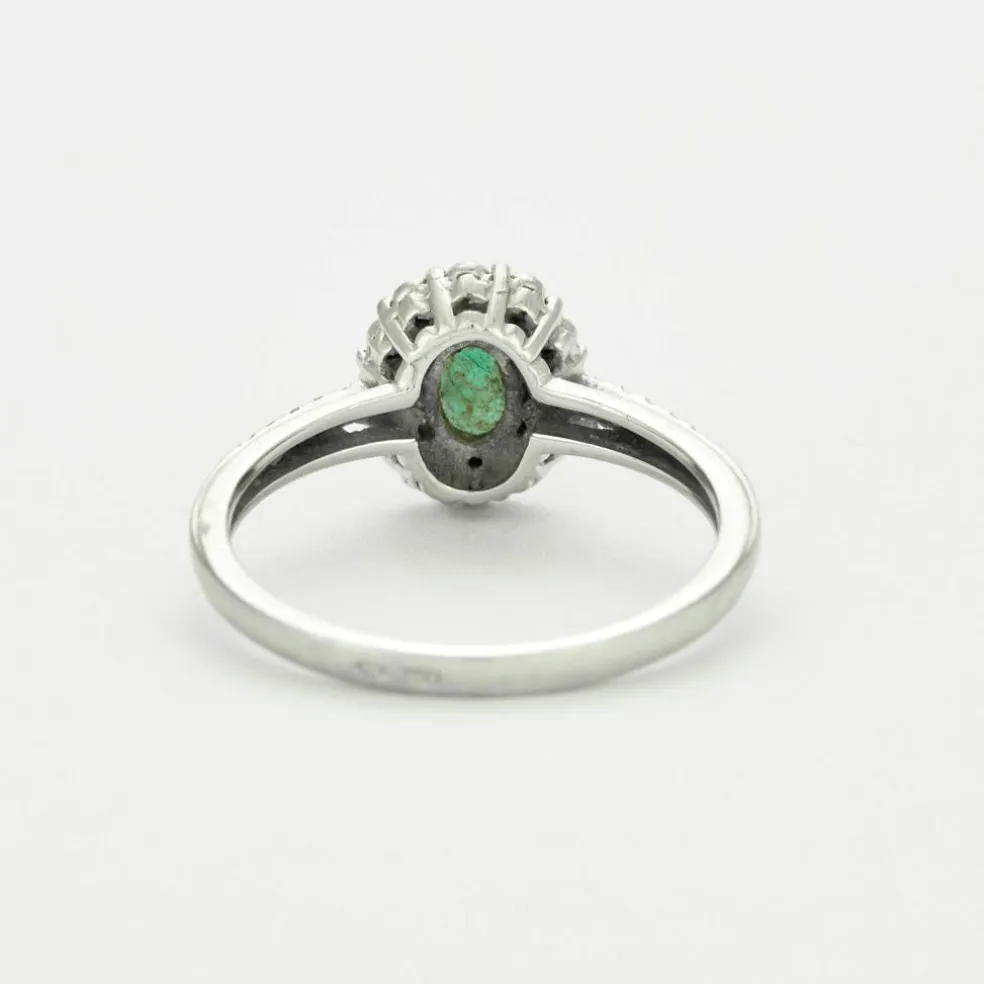 Bague en or gris émeraude et diamants