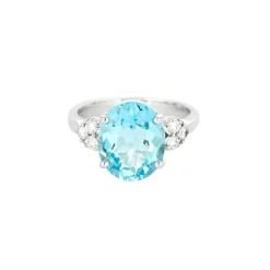 Bague en or gris topaze et diamants