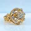 Bague en or jaune 18 carats , diamant 0,70 carat entouré de 8 diamants
