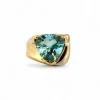 Bague en or jaune 18 carats et topaze bleue