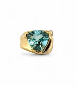 Bague en or jaune 18 carats et topaze bleue