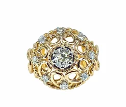 Bague en or jaune 18 carats , diamant 0,70 carat entouré de 8 diamants