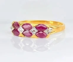 Bague en or jaune 18 carats, 6 rubis et 4 diamants