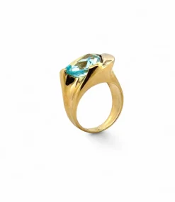 Bague en or jaune 18 carats et topaze bleue