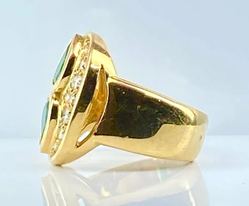Bague en or jaune 18 carats, émeraudes et diamants