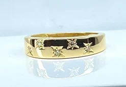 Bague en or jaune 18 carats sertie de 5 diamants