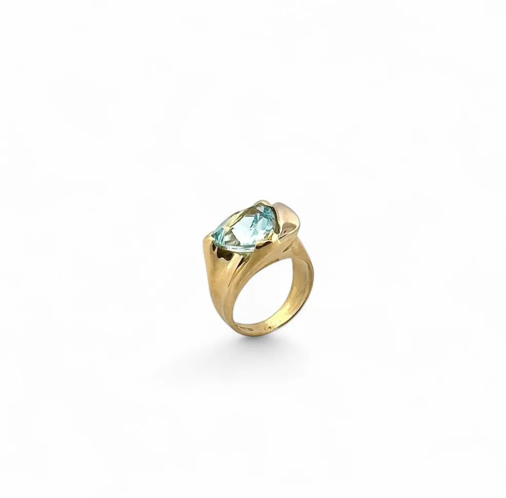Bague en or jaune 18 carats et topaze bleue