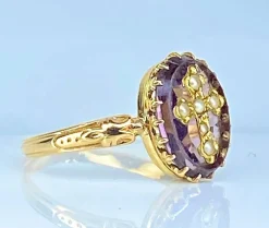 Bague en or jaune 18 carats ornée d’une croix en perles fines