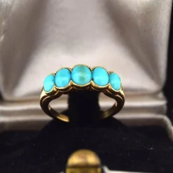BAGUE EN OR JAUNE 18 KT AVEC CABOCHON TURQUOISE