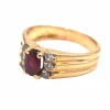 Bague en or jaune 750 mil et rubis