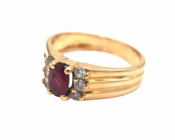 Bague en or jaune 750 mil et rubis