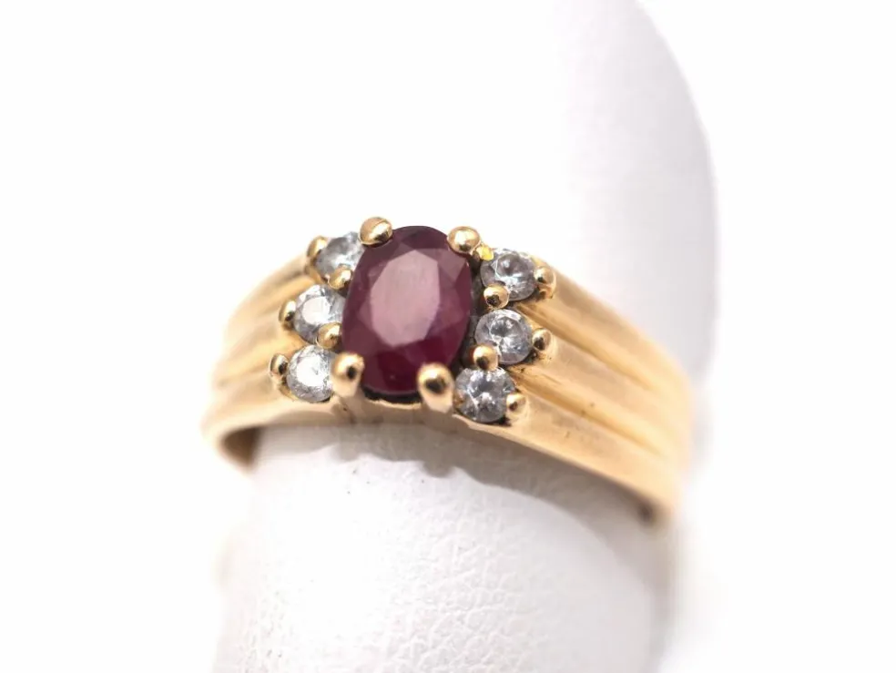 Bague en or jaune 750 mil et rubis