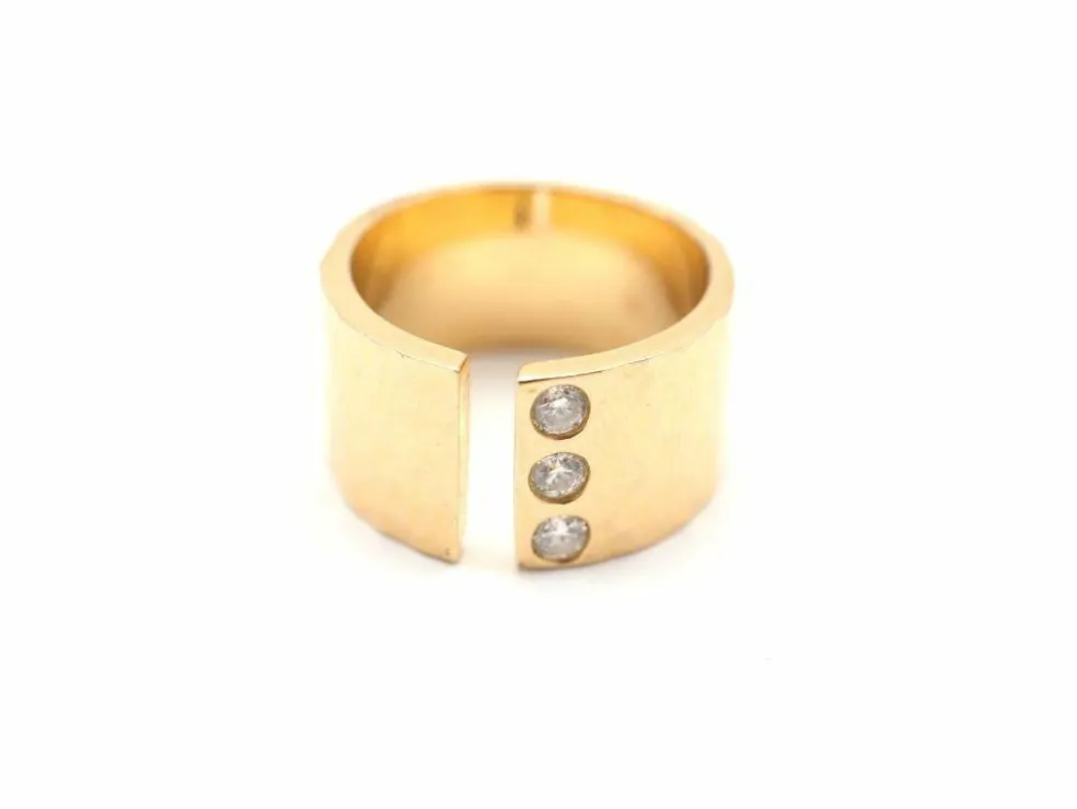 Bague en or jaune 750 mil et diamants