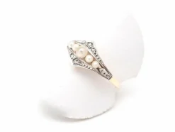 Bague en or jaune 750 mil, perle et diamants