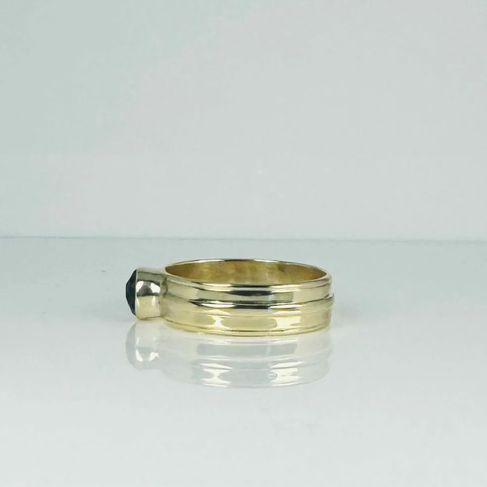 Bague en or jaune avec quartz fumé à facettes rondes