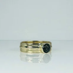 Bague en or jaune avec quartz fumé à facettes rondes