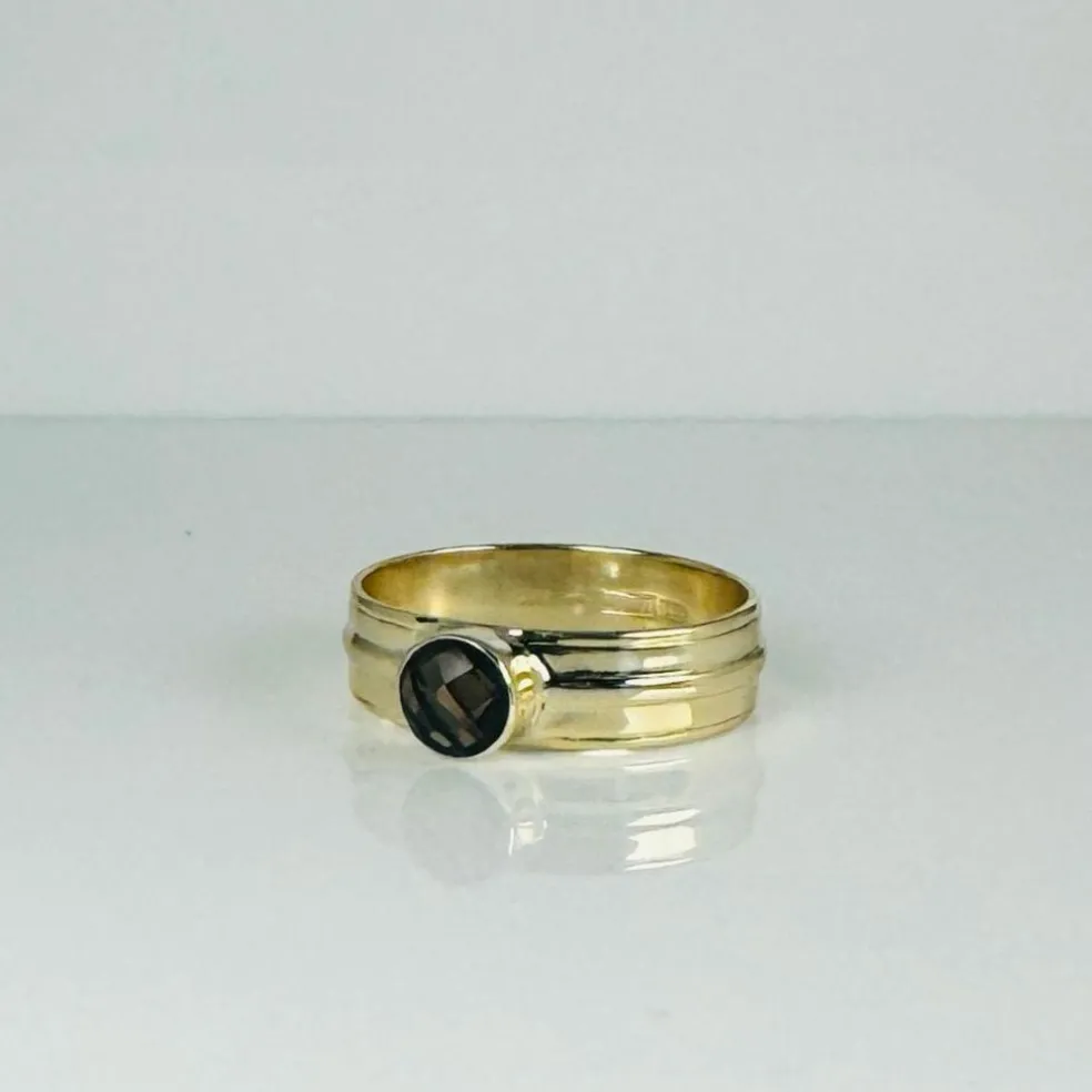 Bague en or jaune avec quartz fumé à facettes rondes
