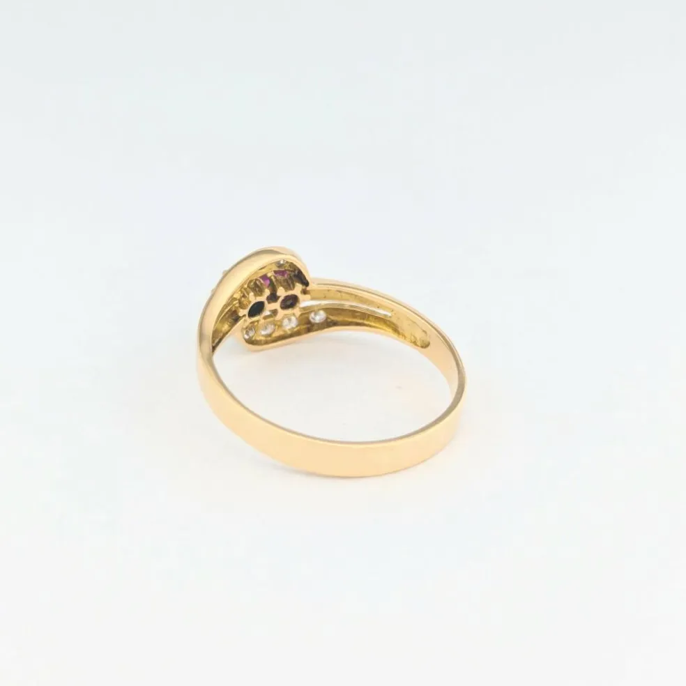 Bague en or jaune diamants rubis et émeraude