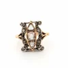 Bague en or jaune et argent avec diamant rose central et diamants latéraux