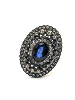 Bague en or jaune et argent, saphir central et diamants