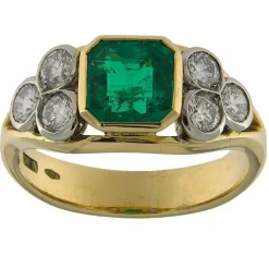 Bague en or jaune et blanc avec émeraude et diamants
