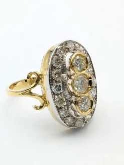 Bague en or jaune et blanc avec ancienne mine et huit huit diamants