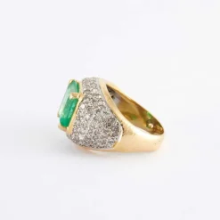 Bague en or jaune et blanc, diamants, émeraude